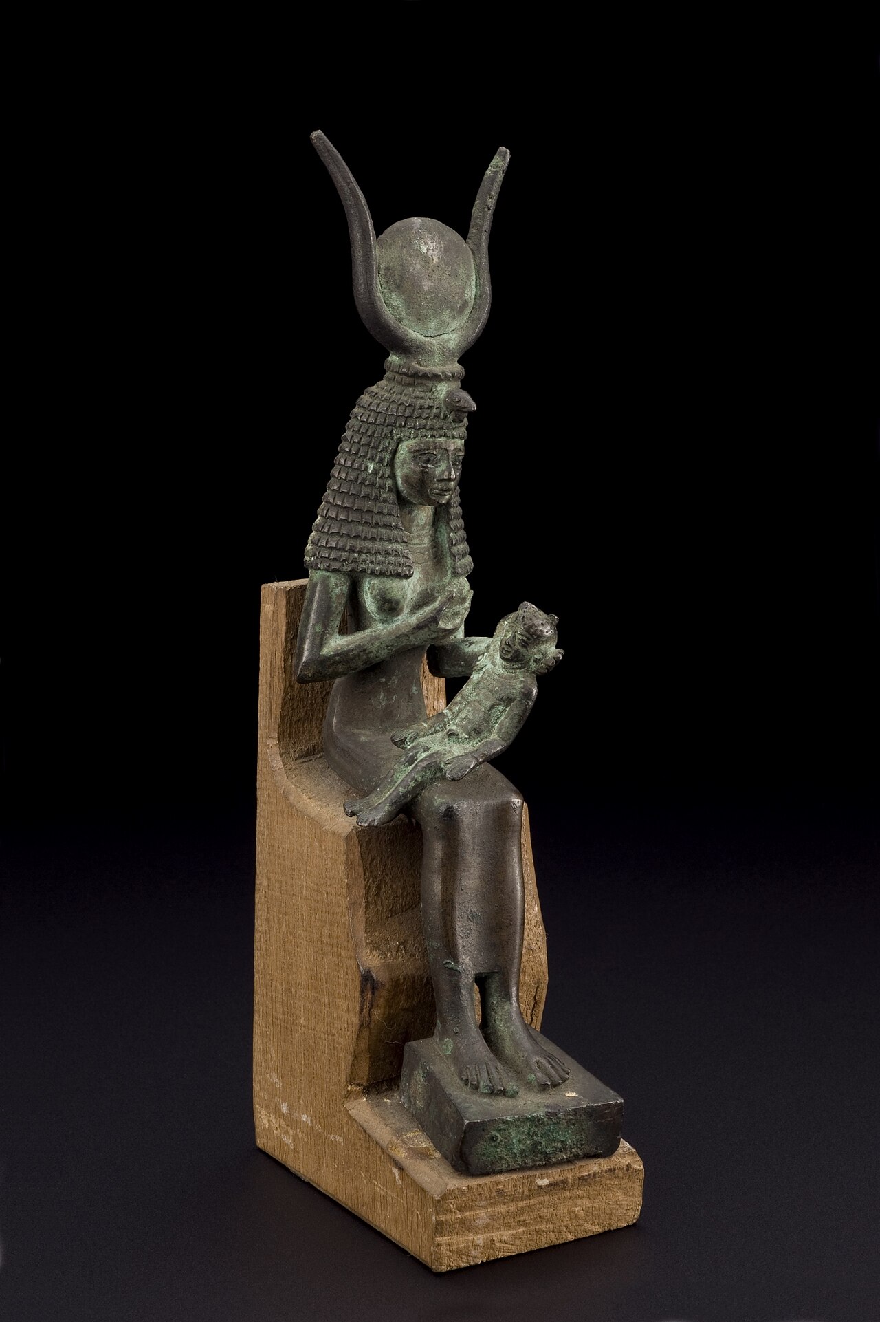 Bronze statue of
         Isis 
        nursing Horus, Egypt, 600–30 BCE