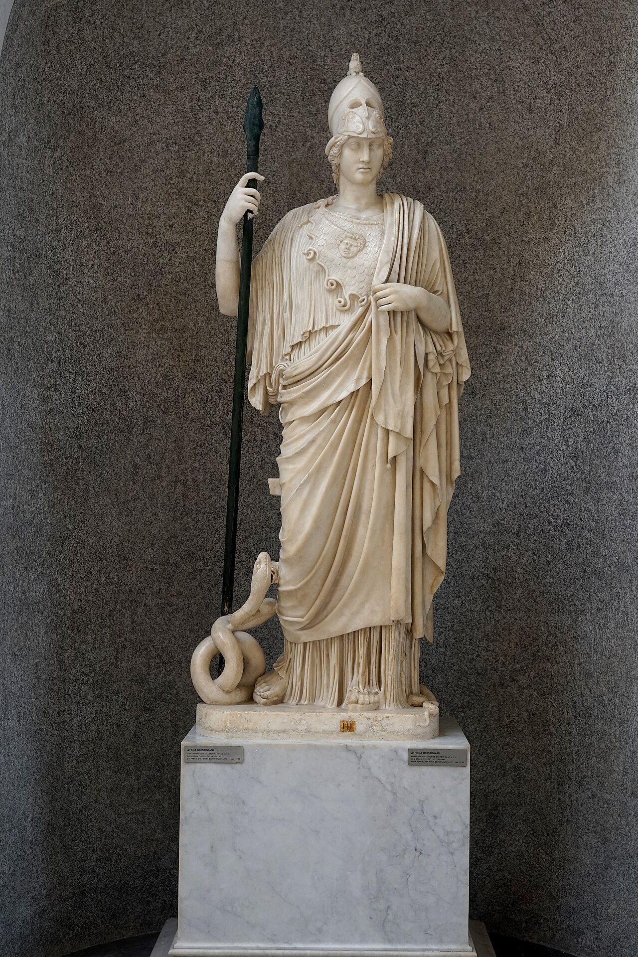 The full standing Athena Giustiniani, helmeted and draped, with the aegis and Gorgon face visible across Her chest.