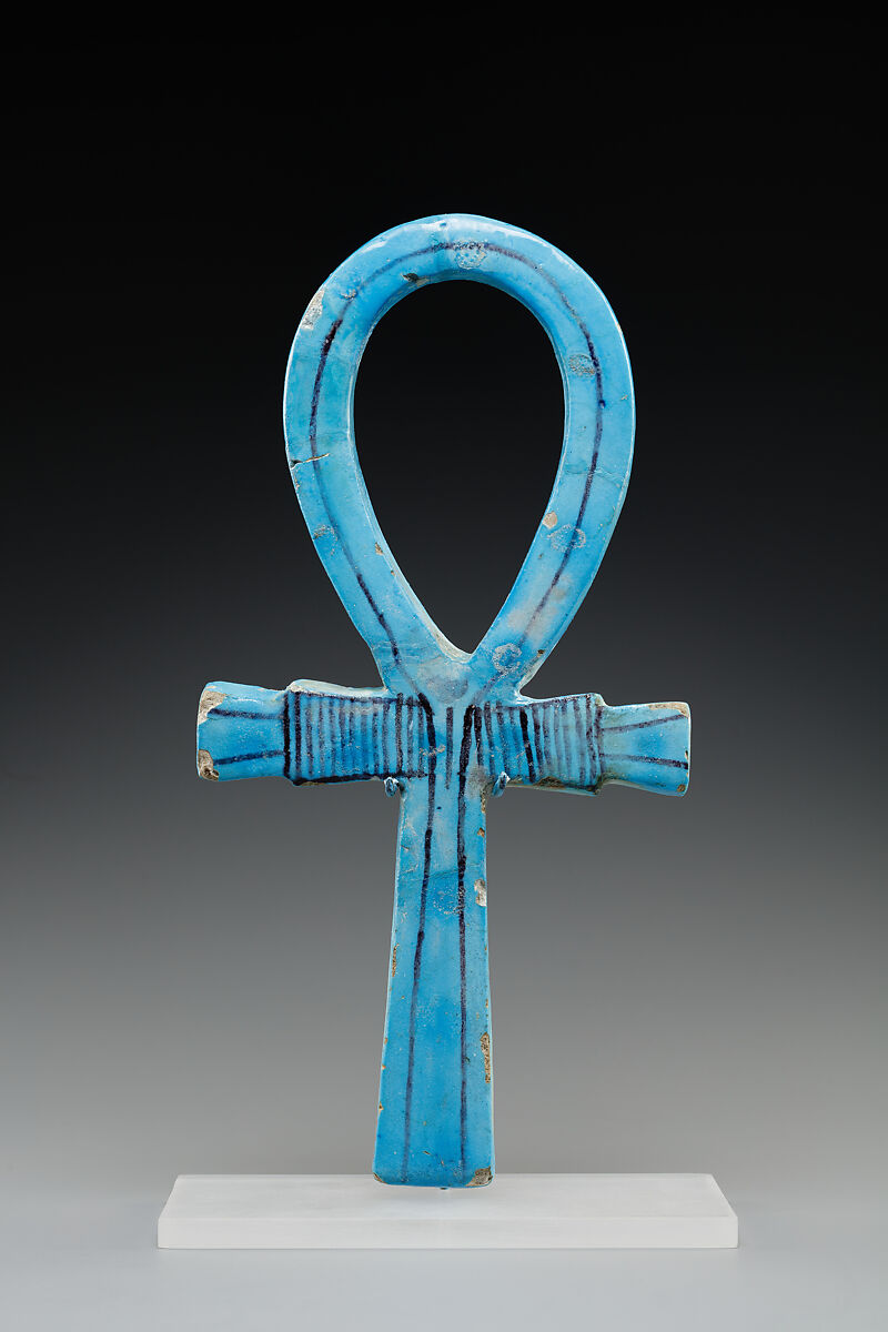Blue faience ceremonial ankh with oval loop and broad crossbar.