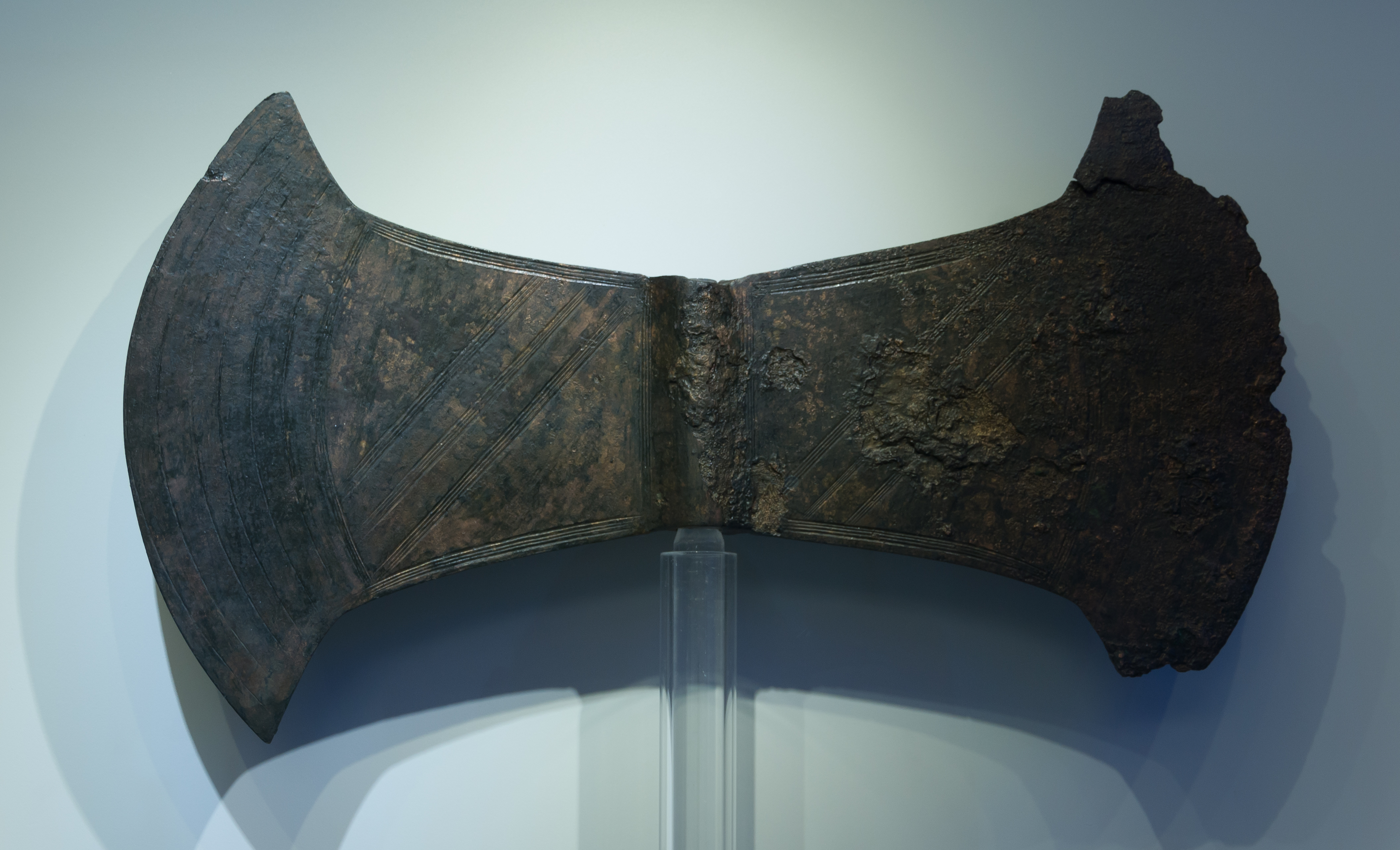 Bronze votive double axe from Arkalochori Cave with two outward-curving blades