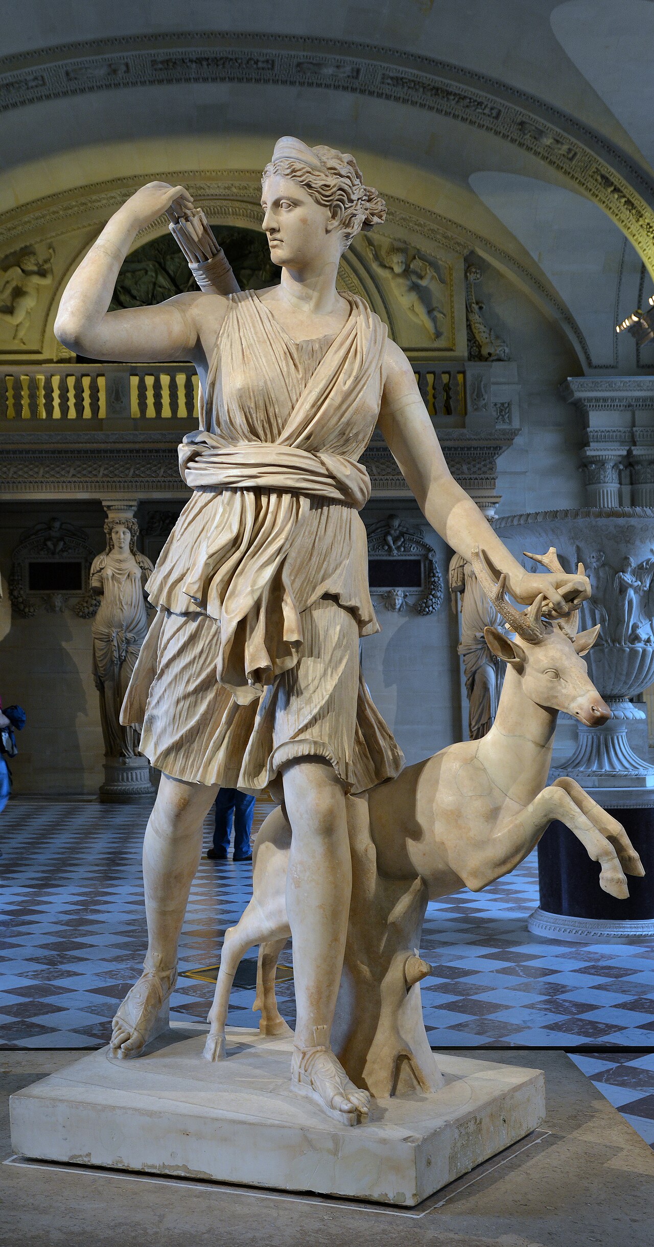 Full marble figure of Artemis beside an antlered deer, the Diana of Versailles