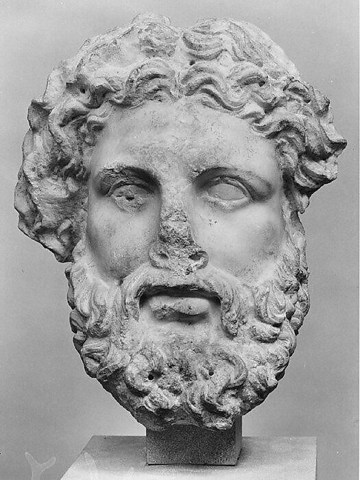 Hellenistic marble head of a bearded deity identified by the museum as probably Zeus