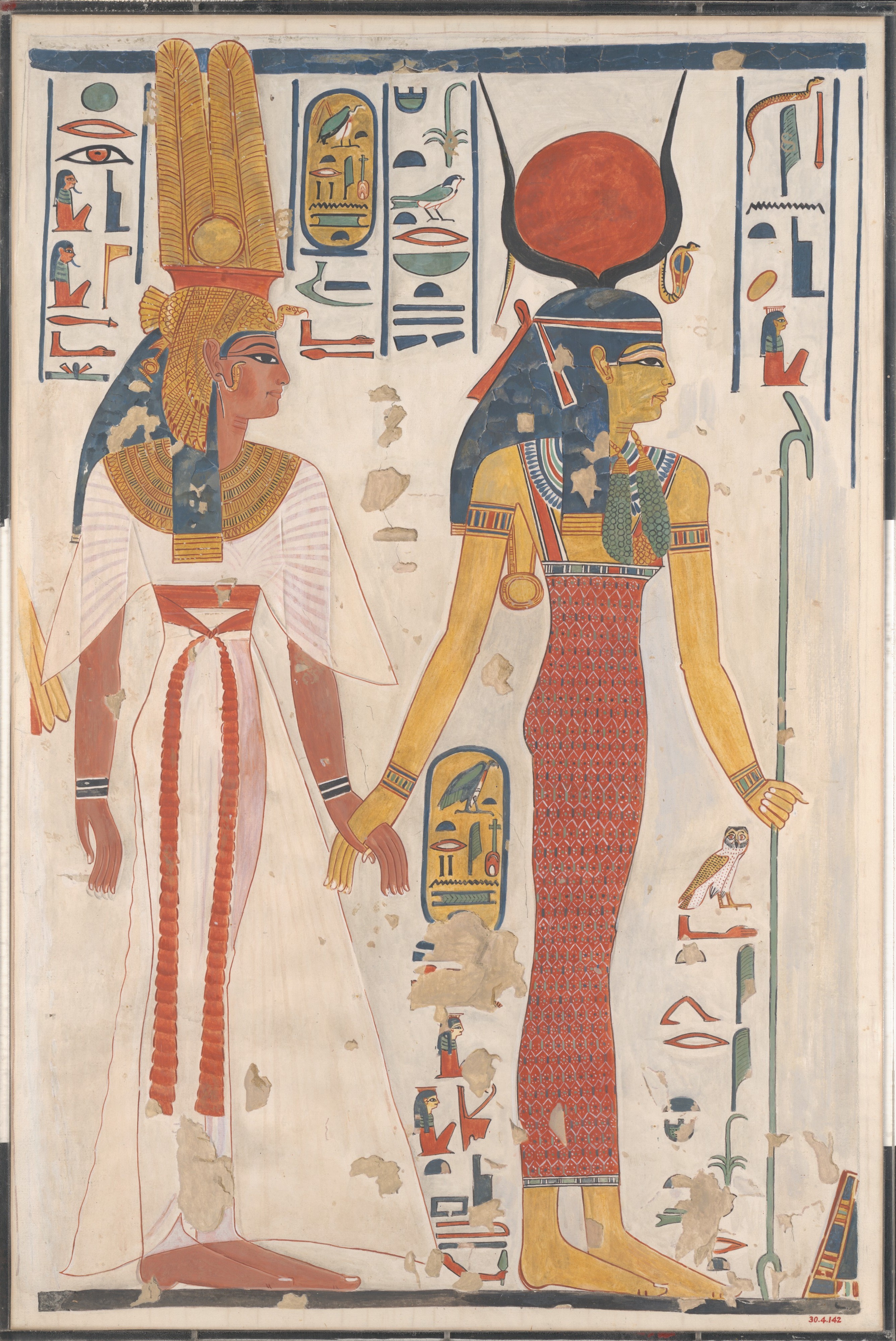 Queen Nefertari in white and Isis in red amid hieroglyphic inscriptions in a painted tomb scene.