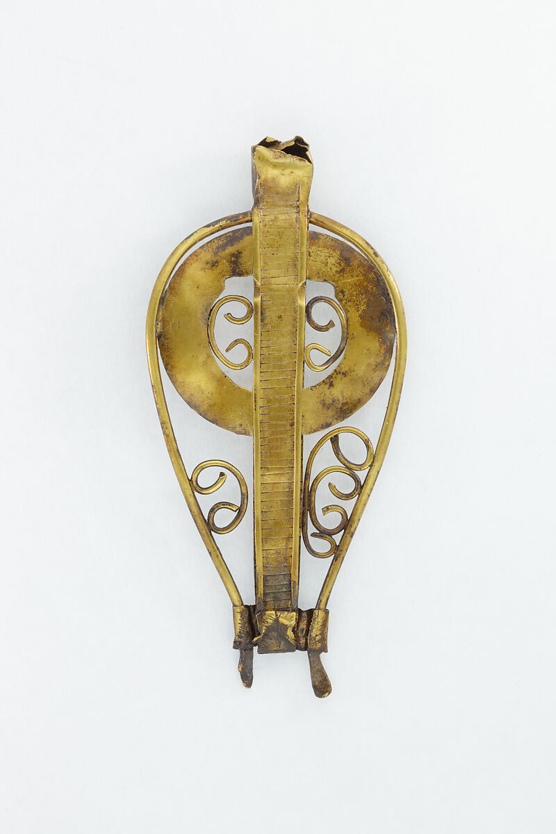 Openwork electrum cobra pendant with missing head and lower section.