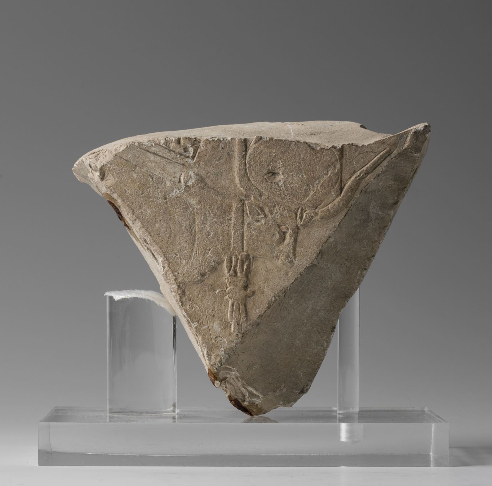 Fragment of a limestone stela with the Hathor cow