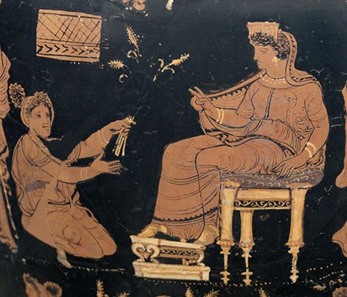 A red-figure vase painting: Demeter enthroned, a youth before her with ears of grain