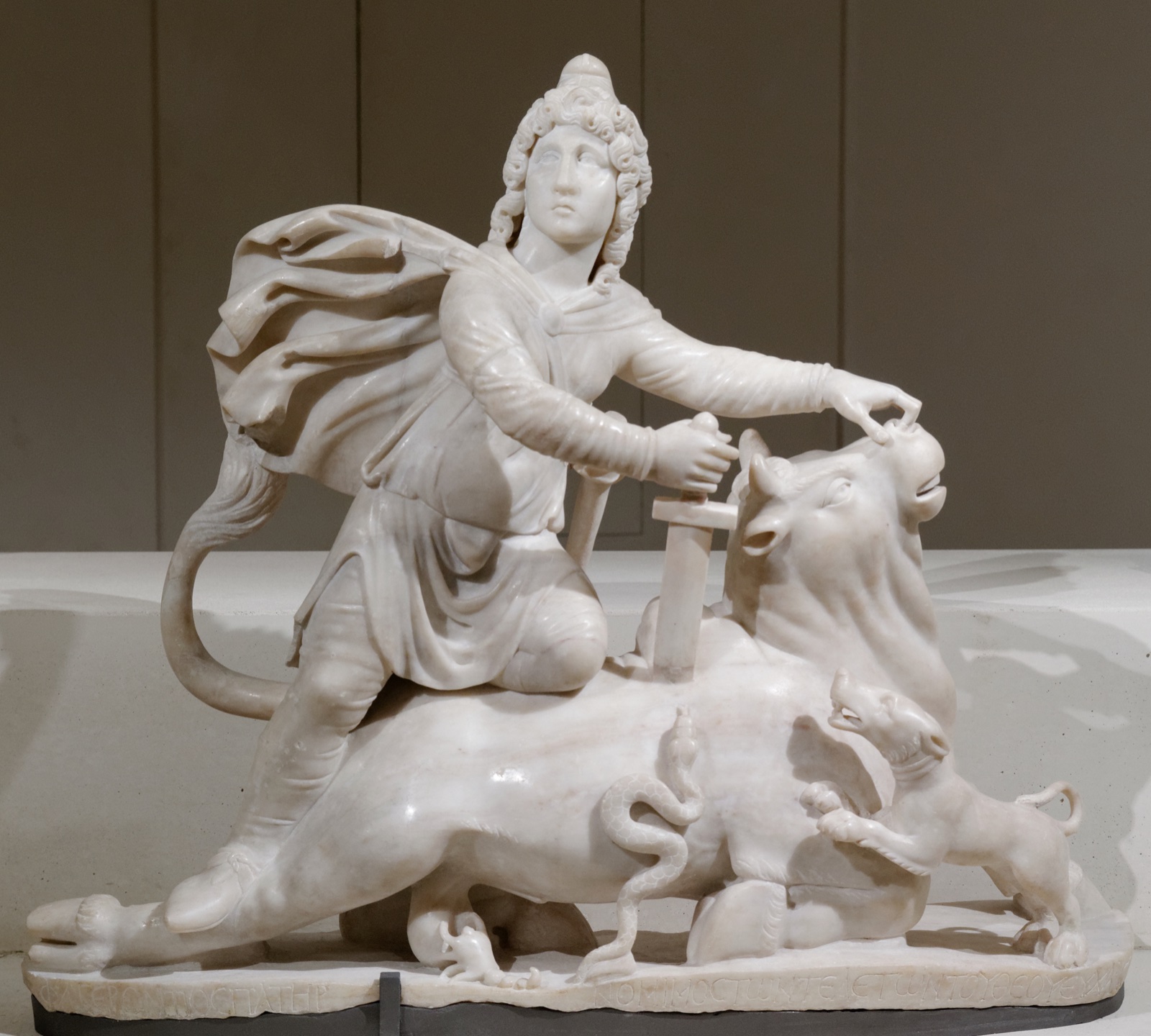 Marble sculpture of Mithras slaying the bull, in the Louvre.