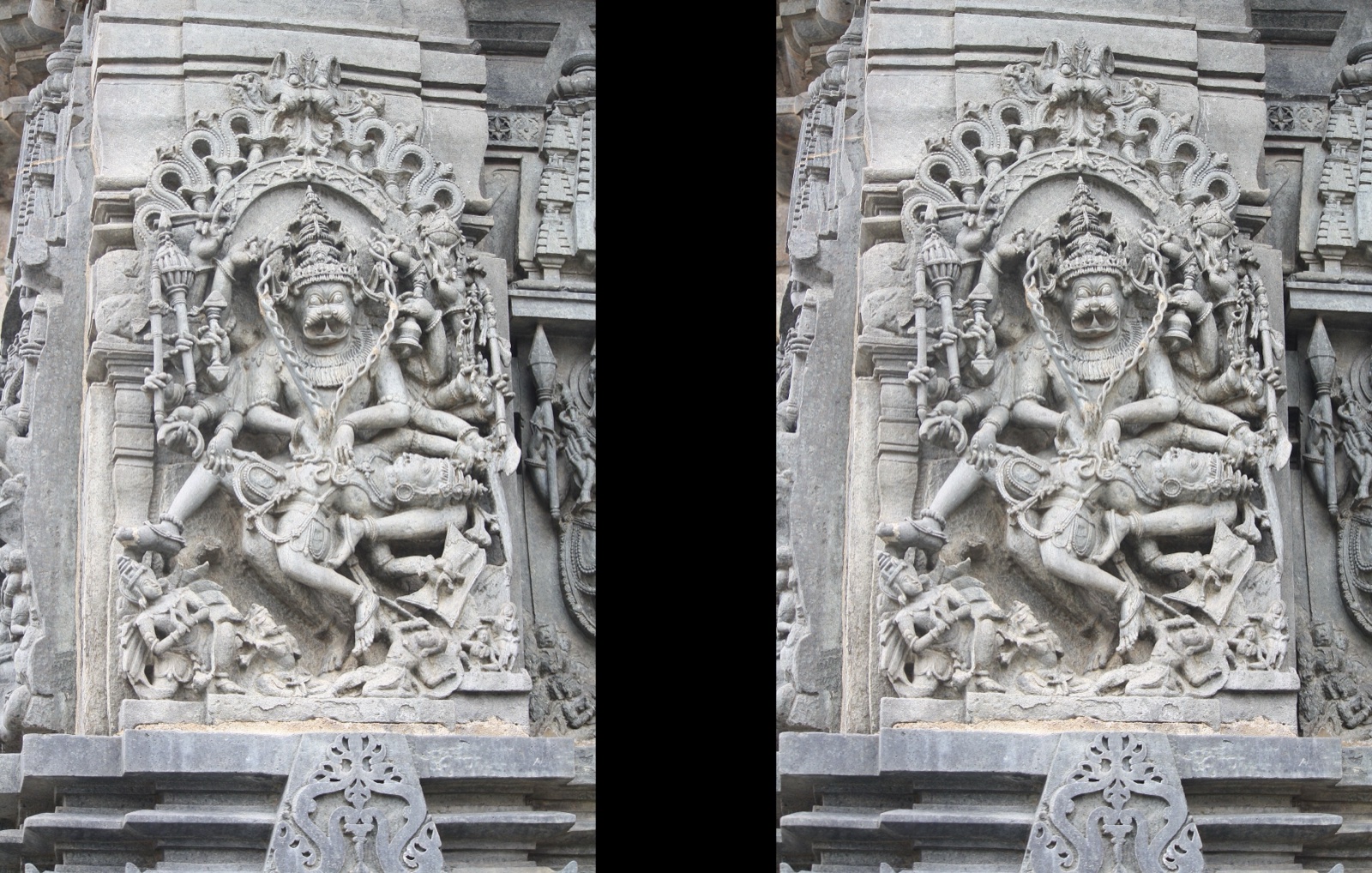 Stone relief of the man-lion Narasimha tearing apart the demon king Hiranyakashipu on a temple wall.