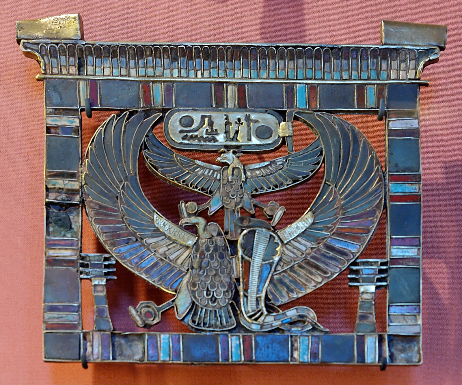Egyptian pectoral bearing the name of Ramesses II, with the vulture of Nekhbet and the cobra of Wadjet.