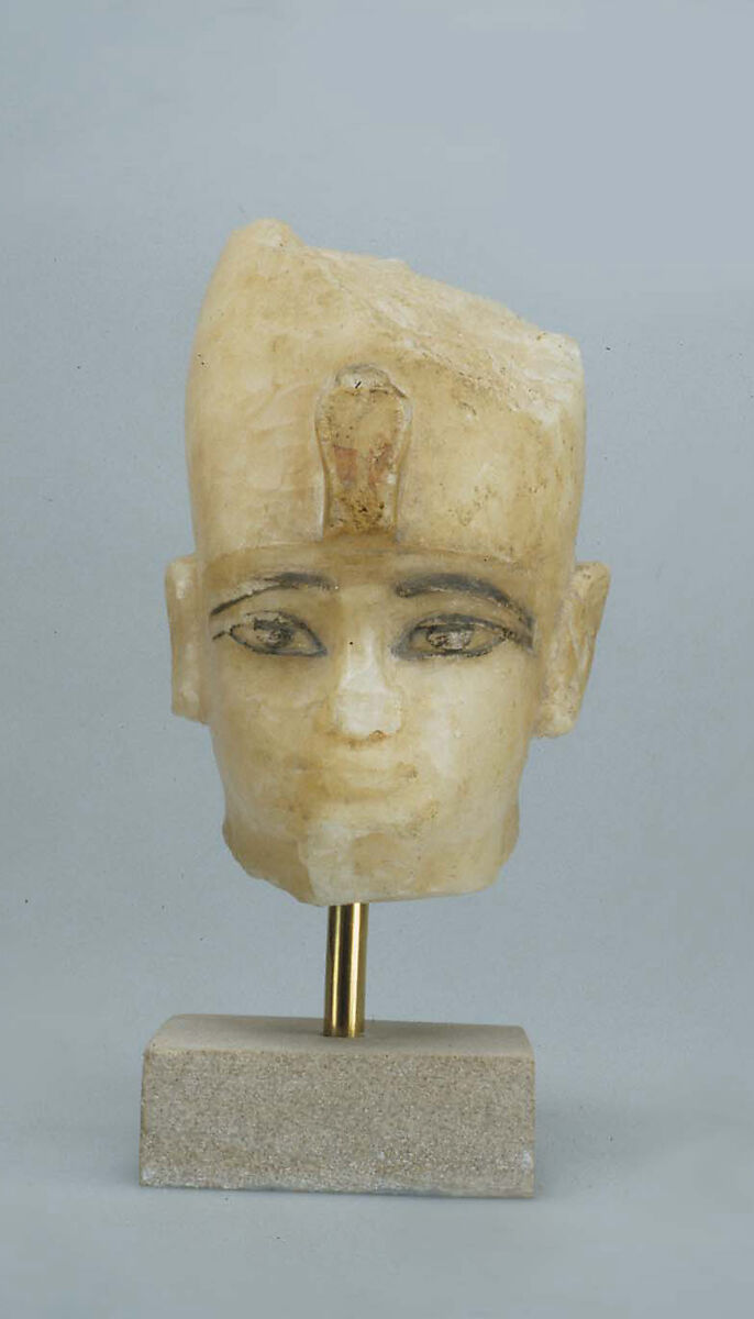 Head of Amenhotep III, fourteenth century BCE, travertine with paint; The Metropolitan Museum of Art, 66.99.29