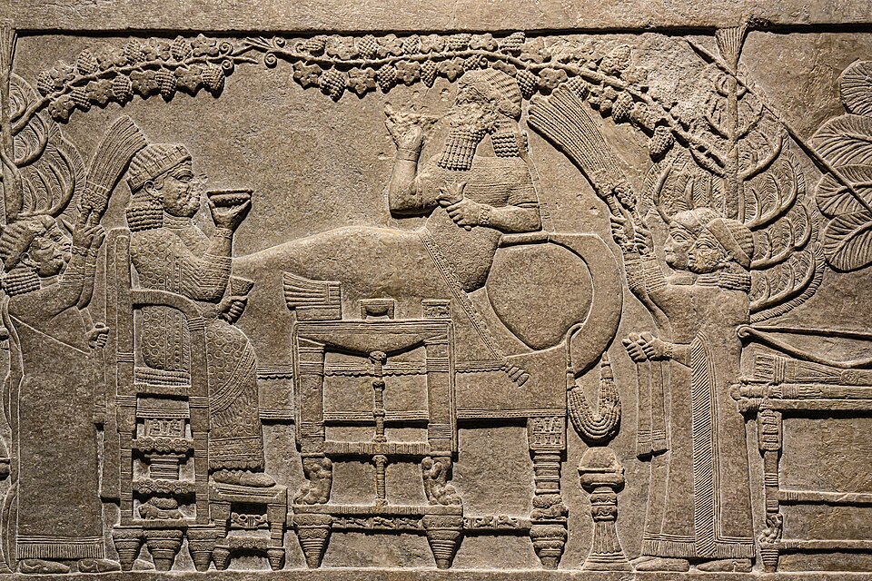 Ashurbanipal reclining in the palace banquet relief from Nineveh, c. 645–640 BCE, British Museum. Ancient royal representation; not an illustration of the library